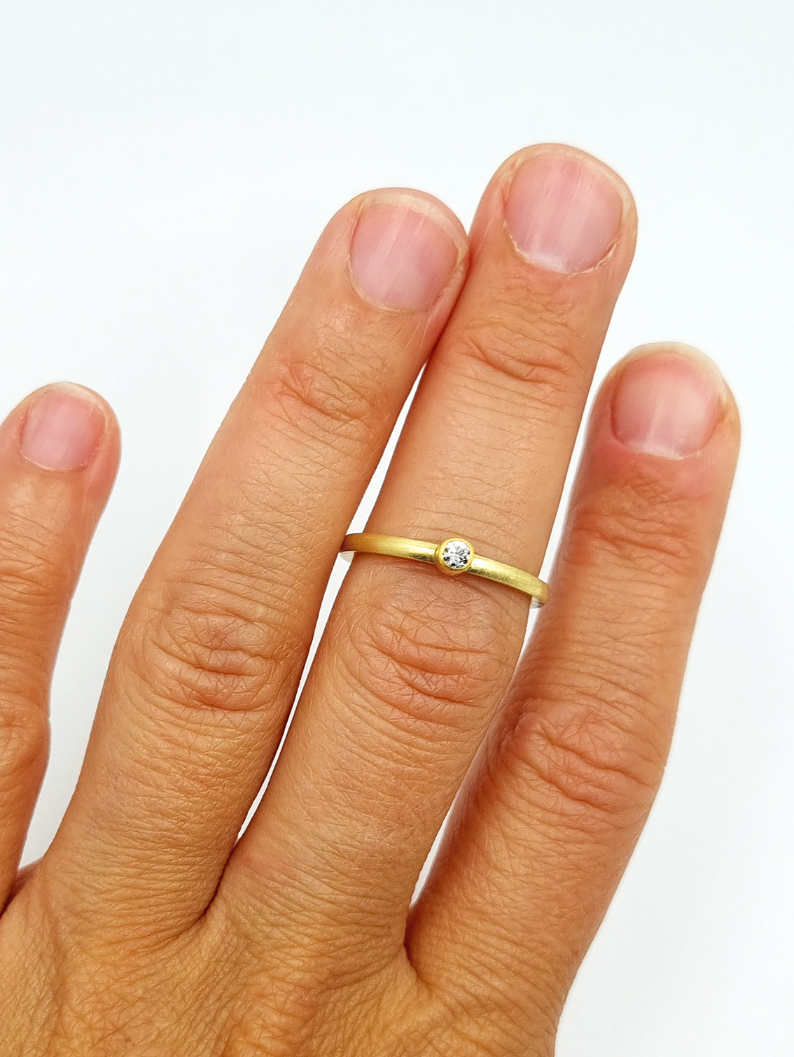Brillantring in 900er und 585er Gold