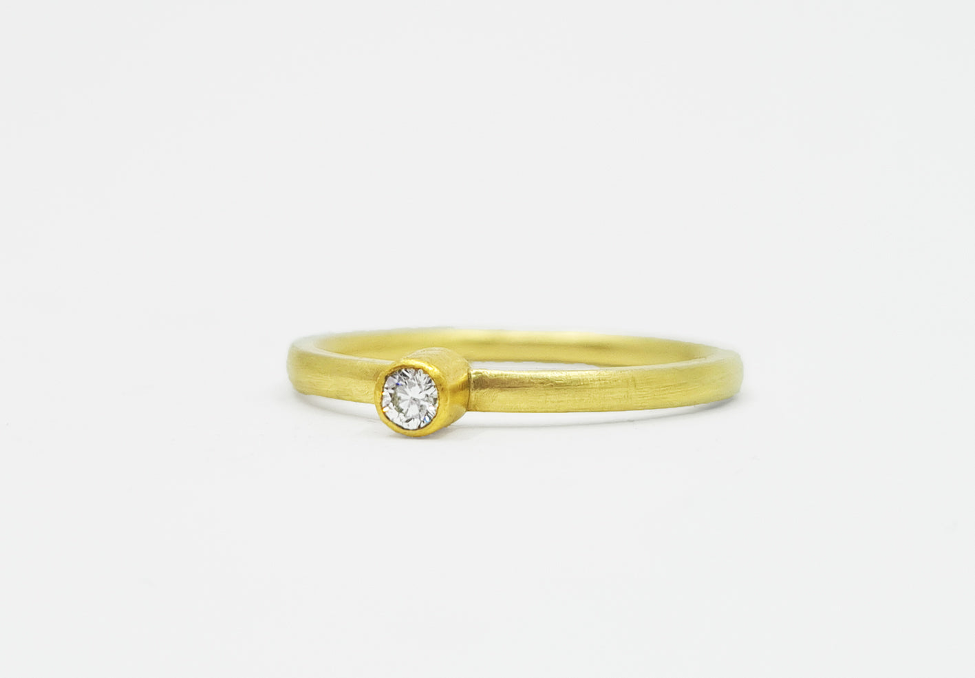 Brillantring in 900er und 585er Gold